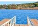 Scenic lake view from the private dock with waterfront homes visible on the opposite shore at 6 Lilla Rosa St, Henderson, NV 89011