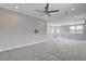 Bright loft space with ceiling fan, tv hookups and plush carpet for a comfortable gathering area at 6 Lilla Rosa St, Henderson, NV 89011