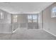 Bright, open loft area with plush carpet and stylish railing with abundant natural light at 6 Lilla Rosa St, Henderson, NV 89011