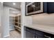 Walk-in pantry with ample shelving, stylish countertops, and additional storage space at 6 Lilla Rosa St, Henderson, NV 89011