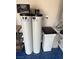 Water filtration system featuring a water softener and filtration tanks at 6 Lilla Rosa St, Henderson, NV 89011