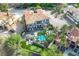 A sprawling estate with a swimming pool, jacuzzi, putting green, and an outdoor fireplace at 6 Rue Du Ville Way, Henderson, NV 89011