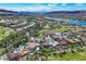 Stunning aerial view of luxury homes, golf course, and waterfront in a beautiful community at 6 Rue Du Ville Way, Henderson, NV 89011