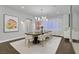 Spacious dining room featuring elegant decor, modern lighting, and a stylish table set at 6 Rue Du Ville Way, Henderson, NV 89011