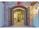 Grand entrance with ornate iron gates and a welcoming courtyard at 6 Rue Du Ville Way, Henderson, NV 89011