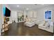 Comfortable living room with fireplace, large TV, and stylish furnishings at 6 Rue Du Ville Way, Henderson, NV 89011