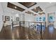 Bright loft area with hardwood floors, a decorative ceiling and modern railing at 6 Rue Du Ville Way, Henderson, NV 89011