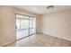 Cozy dining area with tile floors and sliding glass doors leading to the backyard at 620 Macbrey Dr, Las Vegas, NV 89123