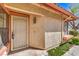 Close-up of the front door featuring a security screen door at 620 Macbrey Dr, Las Vegas, NV 89123
