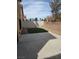 Spacious backyard featuring a concrete patio area and low-maintenance landscaping, ideal for outdoor entertainment at 6476 Ness Gardens Ct, Las Vegas, NV 89122