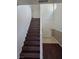 Inviting entryway with hardwood stairs leading to upper level at 6476 Ness Gardens Ct, Las Vegas, NV 89122