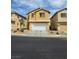 Charming two-story home featuring neutral color palette, a two-car garage, and low maintenance landscaping at 6476 Ness Gardens Ct, Las Vegas, NV 89122