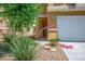 Landscaped front yard and desert landscaping at 6476 Ness Gardens Ct, Las Vegas, NV 89122