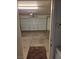 Spacious two-car garage with automatic door, providing ample parking and storage at 6476 Ness Gardens Ct, Las Vegas, NV 89122