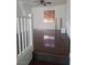 Bright living room with hardwood floors, stairs and plentiful light at 6476 Ness Gardens Ct, Las Vegas, NV 89122