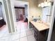 Bathroom features tiled shower, a vanity and tile flooring, creating a clean and stylish space at 6540 Tara Ave, Las Vegas, NV 89146