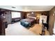 Spacious bedroom with carpet flooring offers comfort and a relaxing retreat at 6540 Tara Ave, Las Vegas, NV 89146