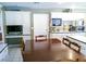 Dining Room with seating for eight and custom built in cabinetry at 6540 Tara Ave, Las Vegas, NV 89146
