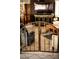 View of Living Room from behind a gated stairway at 6540 Tara Ave, Las Vegas, NV 89146