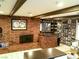 Recreation room featuring a fireplace, bar area, and lots of pictures at 6540 Tara Ave, Las Vegas, NV 89146