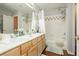 Bathroom featuring a double vanity, with a bathtub and shower combo at 6617 Golden Bit Ave, Las Vegas, NV 89131
