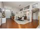Spacious dining area featuring hardwood floors, stylish decor, and ample natural light for Gathering gatherings at 6617 Golden Bit Ave, Las Vegas, NV 89131