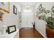 Inviting foyer with hardwood floors and elegant decor, creating a warm and welcoming first impression at 6617 Golden Bit Ave, Las Vegas, NV 89131