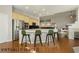 Open kitchen with an island, stainless steel appliances, and pendant lighting at 6617 Golden Bit Ave, Las Vegas, NV 89131