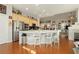 Spacious eat-in kitchen with center island, stainless steel appliances, and breakfast bar seating at 6617 Golden Bit Ave, Las Vegas, NV 89131