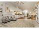 Open-concept living room seamlessly connecting to the dining area, creating an ideal space for entertaining at 6617 Golden Bit Ave, Las Vegas, NV 89131