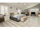 Cozy main bedroom featuring neutral tones, shuttered windows, and a comfortable bed at 6617 Golden Bit Ave, Las Vegas, NV 89131