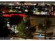 Enjoy this unit's spectacular city views at night with bright lights and lush trees in the foreground at 6955 Durango Dr # 3092, Las Vegas, NV 89149