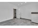 Bright bedroom with tile floors, fresh white walls, and a walk-in closet, offering a clean and modern look at 6955 N Durango Dr # 1074, Las Vegas, NV 89149