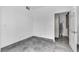 Clean bedroom with tile floors, access to a walk-in closet, and neutral walls, creating a comfortable and inviting space at 6955 N Durango Dr # 1074, Las Vegas, NV 89149