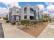 Stylish condo building featuring well-maintained landscaping and a neutral color palette exterior at 6955 N Durango Dr # 1074, Las Vegas, NV 89149