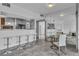 Bright open-concept living space with breakfast bar at 6955 N Durango Dr # 1074, Las Vegas, NV 89149