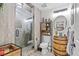 Unique bathroom with barrel vanity, stone shower floor, and rustic accents for a charming, spa-like feel at 6995 Rogers St, Las Vegas, NV 89118