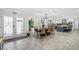 Open concept floor plan showcasing a lovely dining area and flowing access to the gourmet kitchen at 6995 Rogers St, Las Vegas, NV 89118