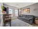 Inviting living room featuring comfortable seating and windows providing ample light at 6995 Rogers St, Las Vegas, NV 89118
