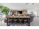 Bright living room with a wooden accent wall and stylish furniture, creating a cozy and inviting atmosphere at 6995 Rogers St, Las Vegas, NV 89118