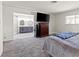 Carpeted main bedroom with an ensuite bathroom at 6995 Rogers St, Las Vegas, NV 89118