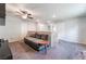 Relaxing loft space features neutral tones, plush carpeting, and comfortable seating at 7322 Dazzle Point St, North Las Vegas, NV 89084