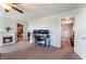 Stylish bedroom with a fireplace, walk-in closet, and dedicated workspace at 7322 Dazzle Point St, North Las Vegas, NV 89084