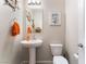 Charming powder room with modern fixtures and decorative nautical accents at 7322 Dazzle Point St, North Las Vegas, NV 89084