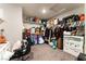 Spacious walk-in closet with custom shelving and ample storage space at 7322 Dazzle Point St, North Las Vegas, NV 89084