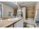 Neutral bathroom featuring granite countertops, and a shower with tub at 8000 Badura Ave # 2063, Las Vegas, NV 89113