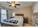Well-lit bedroom featuring a comfortable bed, natural light, and classic décor at 8000 Badura Ave # 2063, Las Vegas, NV 89113