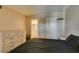 Neutral bedroom with a large dresser and access to the bathroom at 8000 Badura Ave # 2063, Las Vegas, NV 89113