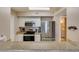 Modern kitchen with stainless steel appliances and granite countertops at 8000 Badura Ave # 2063, Las Vegas, NV 89113