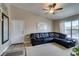 Bright living room with comfortable sofa, ceiling fan, and lots of sunlight at 8000 Badura Ave # 2063, Las Vegas, NV 89113